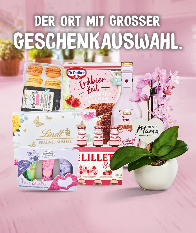 Diese Grafik zeigt einen rosafarbenen, unscharfen Hintergrund mit Tischfl&auml;che. Oben steht als Headline &bdquo;Der Ort mit grosser Geschenkauswahl.&ldquo; In der Mitte sind verschiedene Geschenkartikel und S&uuml;&szlig;waren sowie eine Orchidee im wei&szlig;en Topf abgebildet. Ganz unten ist ein Button &bdquo;Jetzt Angebote entdecken&ldquo;, der zum Klicken einl&auml;dt.