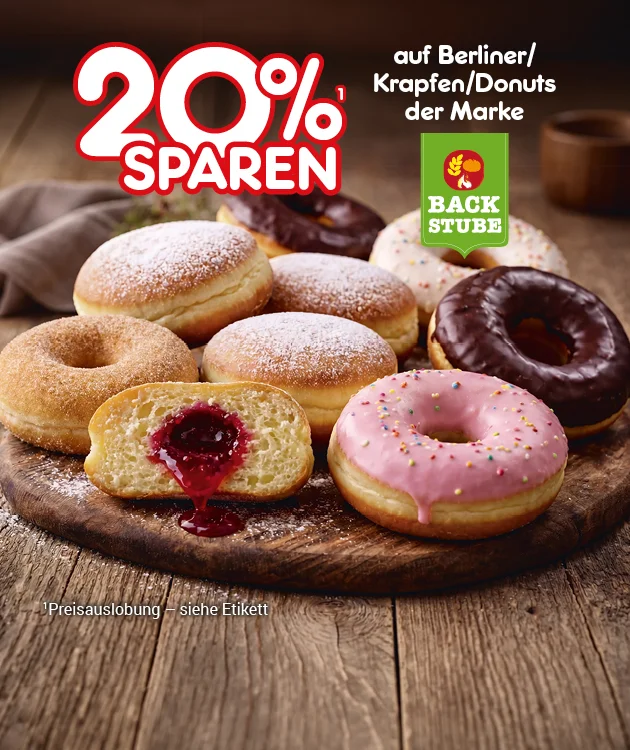 Diese Grafik zeigt Donuts auf einer dunklen, rustikalen Holzoberfl&auml;che mit der Aufschrift &bdquo;zwanzig Prozent sparen auf Berliner, Krapfen, Donuts der Marke Backstube&ldquo; sowie dem Button &bdquo;Weitere Sparangebote entdecken&ldquo;, der unten zum Klicken einl&auml;dt.