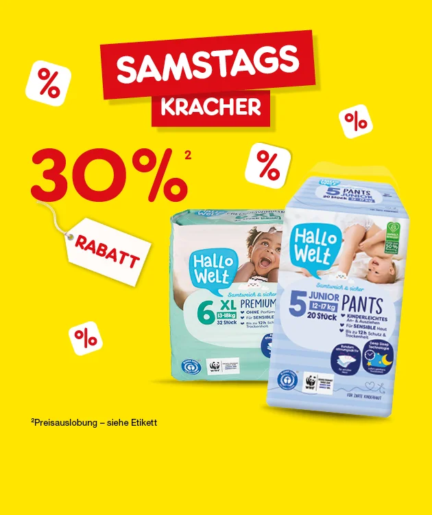 Die Grafik zeigt eine Netto-Aktion. Oben steht in roten K&auml;sten &bdquo;Samstags Kracher&ldquo;. Im Hintergrund sind rote Prozentzeichen auf gelbem Grund zu sehen. In der Mitte steht gro&szlig; &bdquo;Drei&szlig;ig Prozent&ldquo; und daneben ein wei&szlig;es Preisschild mit rotem Schriftzug &bdquo;Rabatt&ldquo;. Darunter sind zwei Packungen Hallo Welt Windeln abgebildet, eine XL Premium und eine Junior Pants. Unten links steht der Hinweis &bdquo;Preisauslobung &ndash; siehe Etikett&ldquo;. In der Mitte unten ist ein wei&szlig;es Feld mit rotem Rand und dem Text &bdquo;Weitere Kracher-Angebote&ldquo;, der zum Klicken einl&auml;dt.